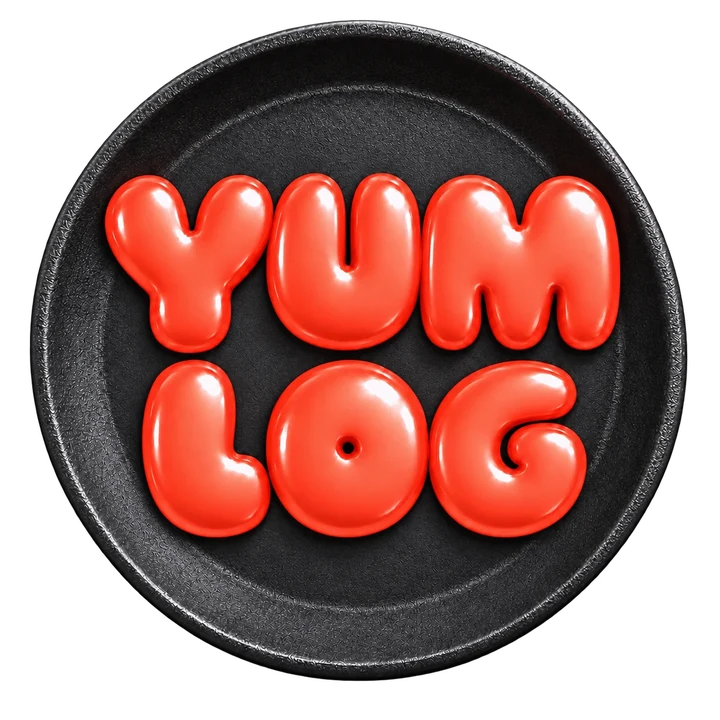 The YumLog logo on a cast-iron plate